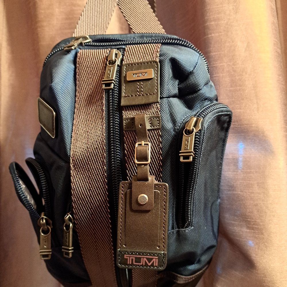 Tumi Blue and Brown Backpack with Leather Accents